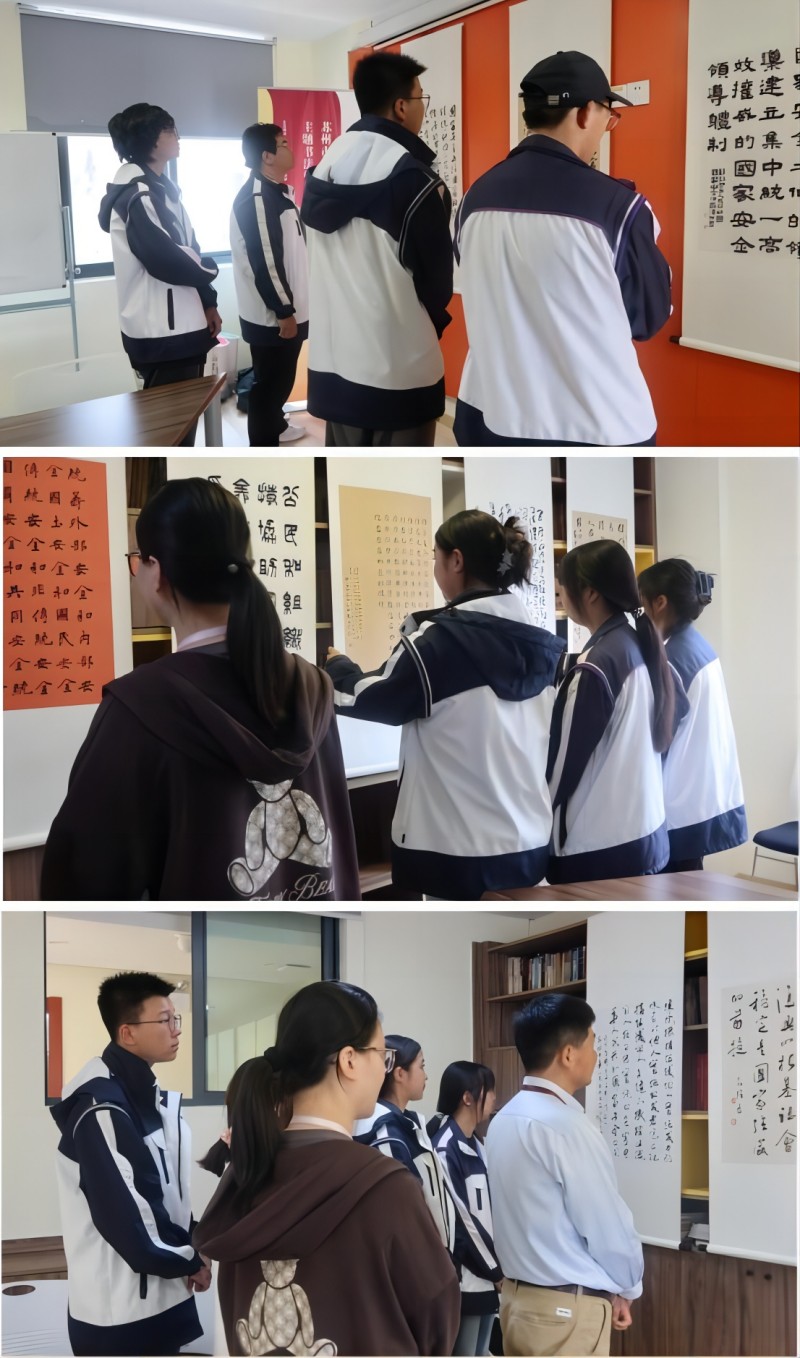 师生们观摩苏州市“全民国家安全教育宣传”主题书法展.jpg